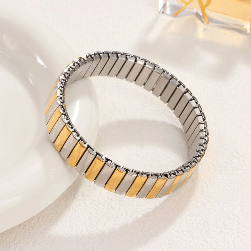 Pulseira Feminina de Aço Titânio com Coração – Design Elástico, Banhada a Ouro