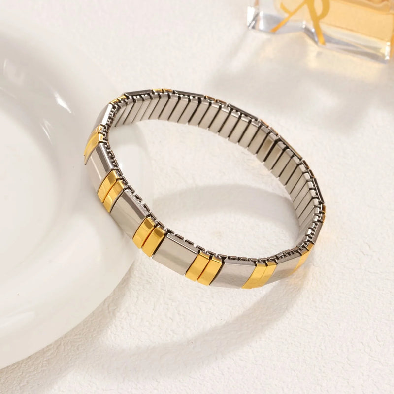 Pulseira Feminina de Aço Titânio com Coração – Design Elástico, Banhada a Ouro