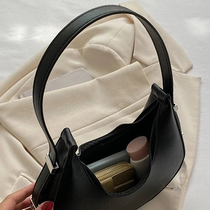 Bolsa feminina elegante em PU de alta qualidade, perfeita como hobo bag, Ideal para viagens, passeios e uso diário, unindo estilo e praticidade.