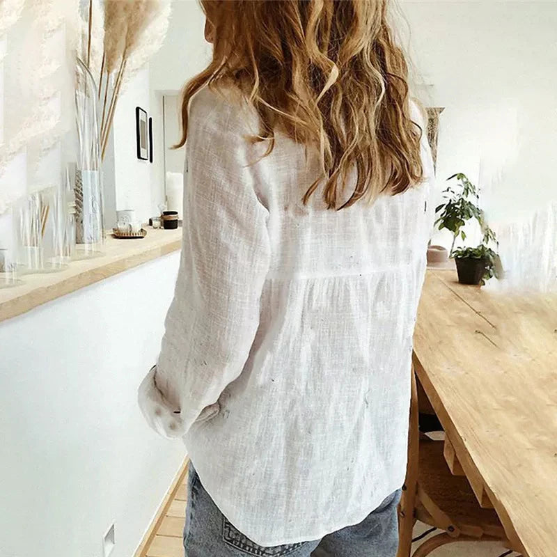 Blusa Feminina de Algodão e Linho – Manga Longa Casual e Elegante Blusa feminina leve e confortável, feita em algodão e linho, com mangas longas, gola com botão e corte solto.