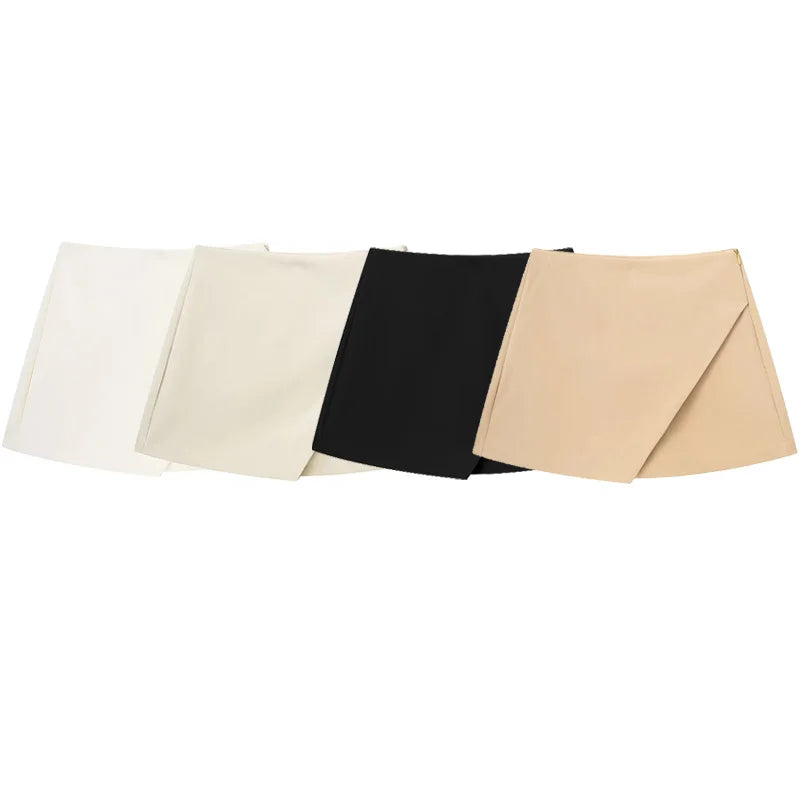 Shorts feminino estilo saia (skort) ideal para looks casuais, fashion e office lady  Disponível em cores clássicas: branco, bege, preto e cáqui  Confeccionado para proporcionar conforto e elegância durante o dia a dia