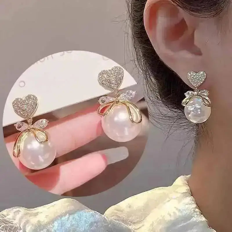 Elegantes brincos femininos com agulha em prata 925, pérolas delicadas e tassel moderno, com detalhes em zircônia. Tendência de moda coreana, perfeitos para complementar looks sofisticados e ocasiões especiais com luxo e brilho.