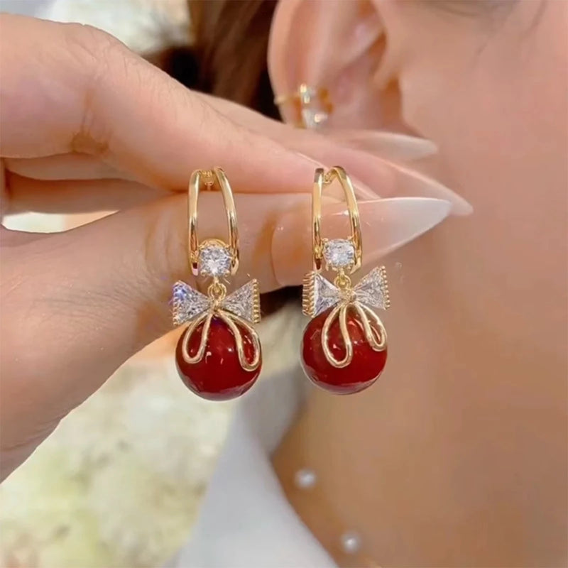 Brincos de Coração com Pérola Artificial – Elegantes e Trendy para Mulheres