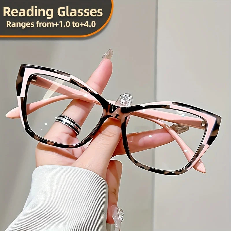 Óculos de leitura femininos com design elegante “cat eye” e bloco de cores moderno. Protege contra luz azul, ideal para uso prolongado em frente a telas de computador e dispositivos móveis.