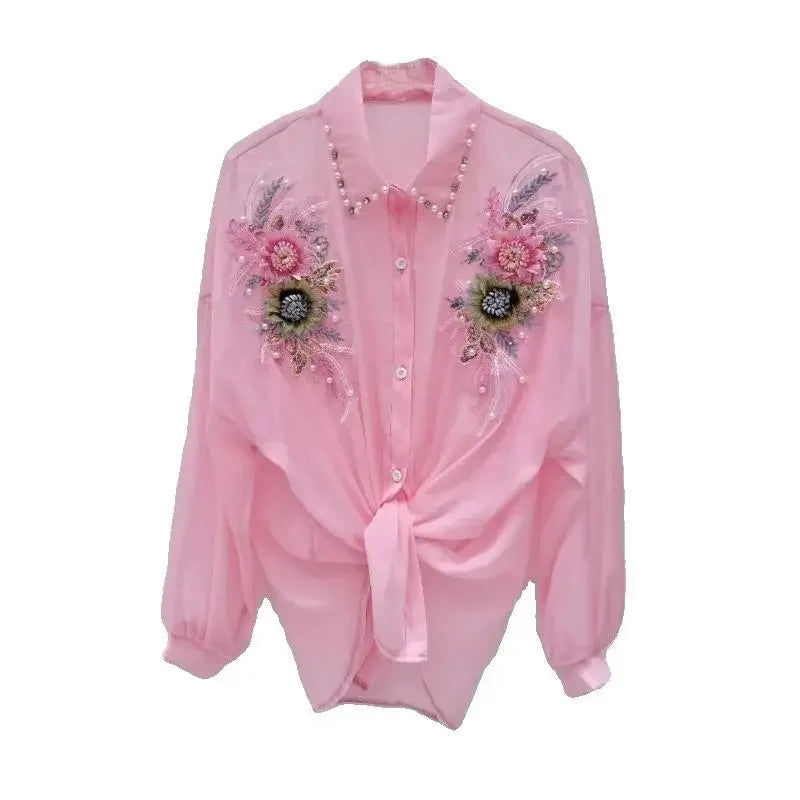 Blusa/Cardigan Feminina com Flores 3D e Bordado de Pedras – Proteção Solar  Design luxuoso com flores 3D e aplicação de pedrarias (beads/diamonds)  manga longa e modelo solto (loose fit) para máximo conforto