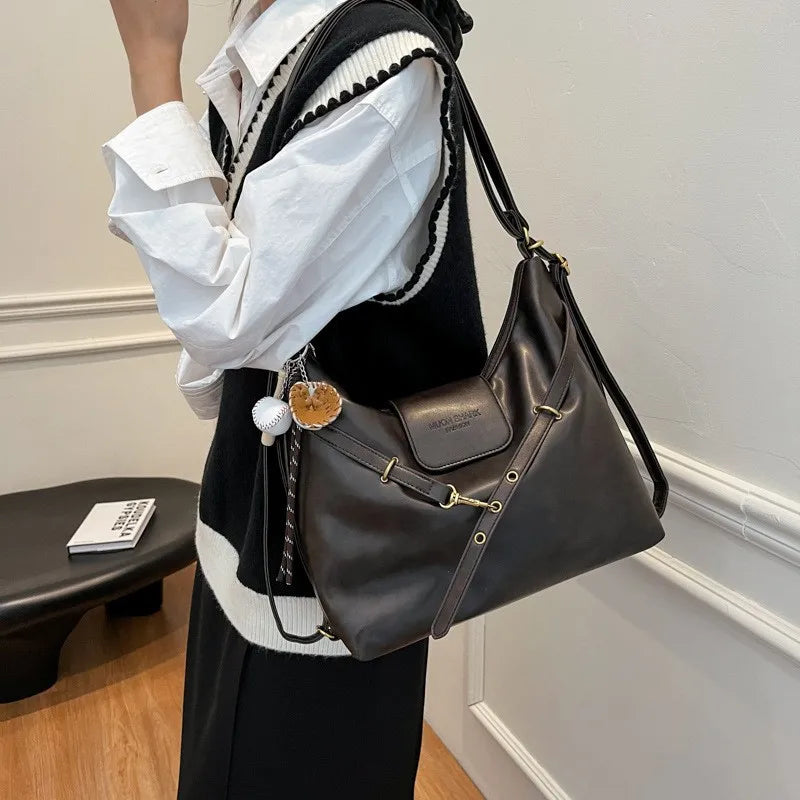 Bolsa feminina elegante e versátil, perfeita para qualquer ocasião. Design moderno 2025, com alta qualidade e acabamento sofisticado, ideal para trabalho, passeios ou eventos.
