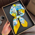 Acessório fashion e versátil em cetim macio, ideal como lenço de pescoço, echarpe, hijab, faixa de cabelo, bandana ou detalhe decorativo em bolsas. Elegância e estilo em qualquer ocasião.