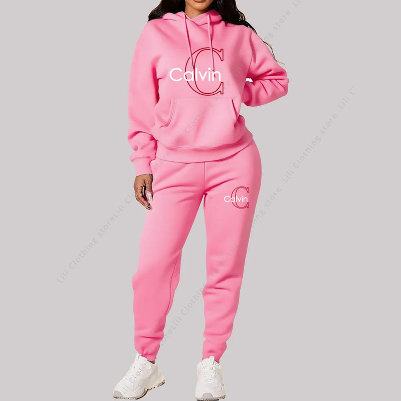 Eleve seu estilo casual com este conjunto feminino 2 peças 2026, composto por hoodie de capuz confortável e calça de moletom de alta qualidade.