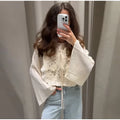 Conjunto Feminino Elegante 2025 – Saia Mini e Blusa com Bordado e Manga Flare