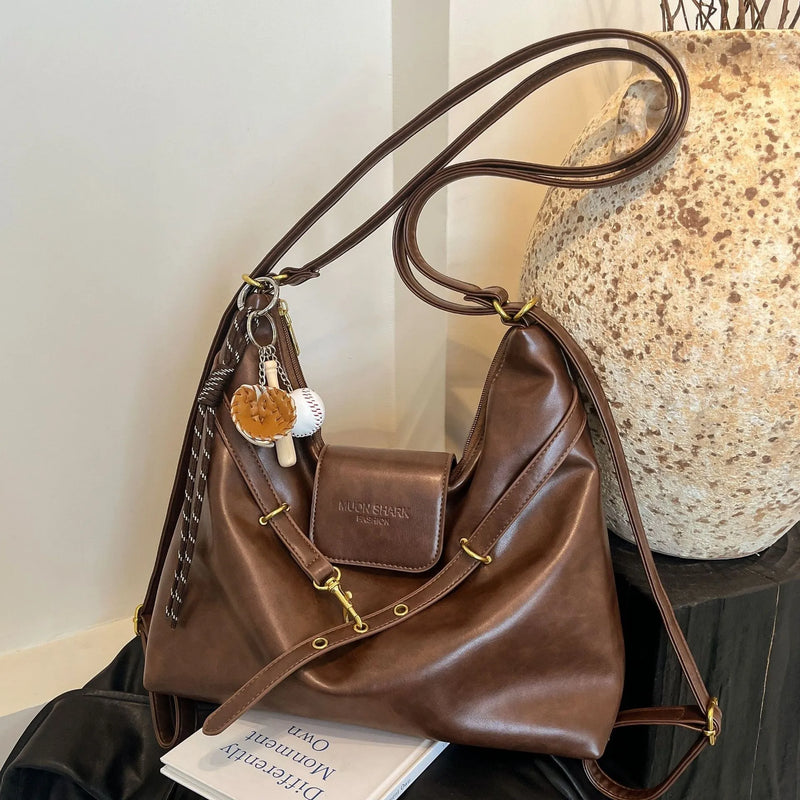 Bolsa feminina elegante e versátil, perfeita para qualquer ocasião. Design moderno 2025, com alta qualidade e acabamento sofisticado, ideal para trabalho, passeios ou eventos.
