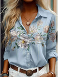 Blusa Feminina de Verão com Estampa Floral – Gola Lapela e Manga Longa  Design feminino com estampa de flores delicadas  Gola com lapela, adicionando toque clássico e elegante  Manga longa, ideal para proteção solar leve e estilo casual