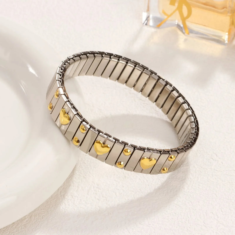 Pulseira Feminina de Aço Titânio com Coração – Design Elástico, Banhada a Ouro