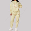 Eleve seu estilo casual com este conjunto feminino 2 peças 2026, composto por hoodie de capuz confortável e calça de moletom de alta qualidade.