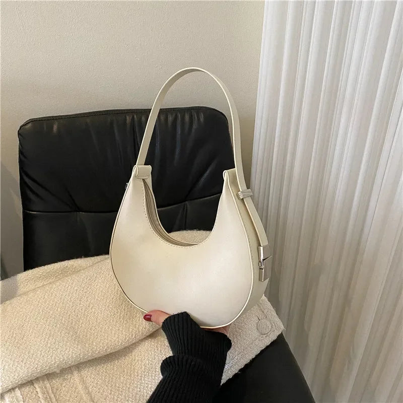 Bolsa feminina elegante em PU de alta qualidade, perfeita como hobo bag, Ideal para viagens, passeios e uso diário, unindo estilo e praticidade.