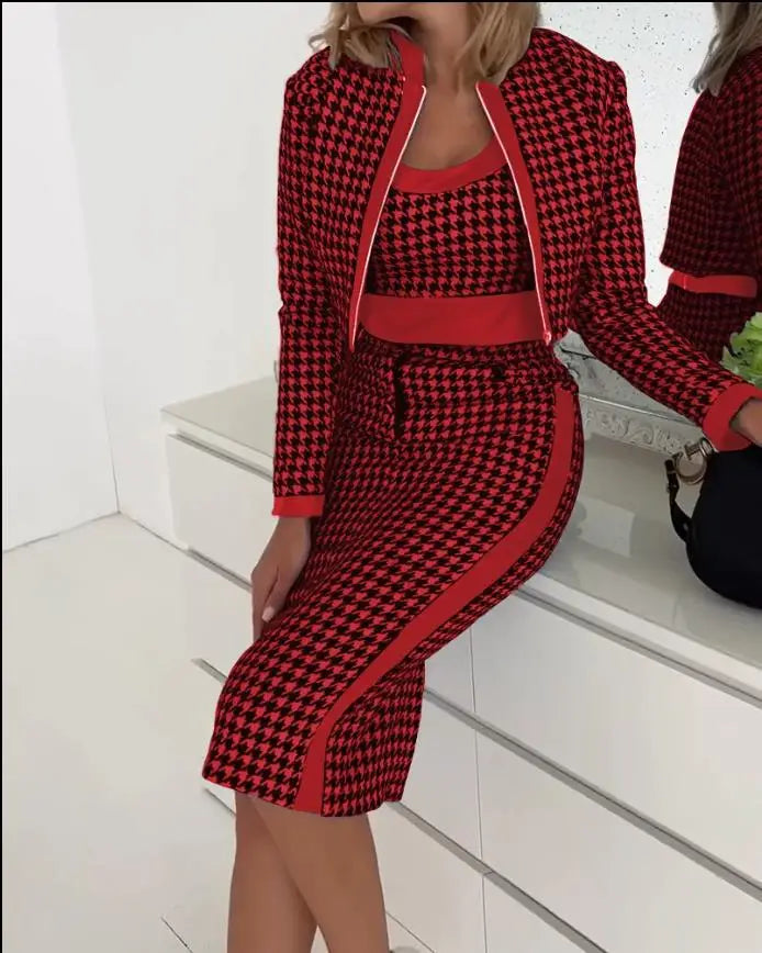 Conjunto elegante composto por top de alças e saia com estampa clássica houndstooth, perfeito para um look sofisticado de escritório ou eventos formais no outono e inverno.