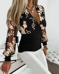 Blusa feminina sofisticada, perfeita para o outono. Possui decote em V profundo, cintura ajustada e mangas