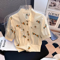 Camisa Feminina de Verão em Algodão e Linho com Bordado Floral – Manga Bufante e Gola Polo
